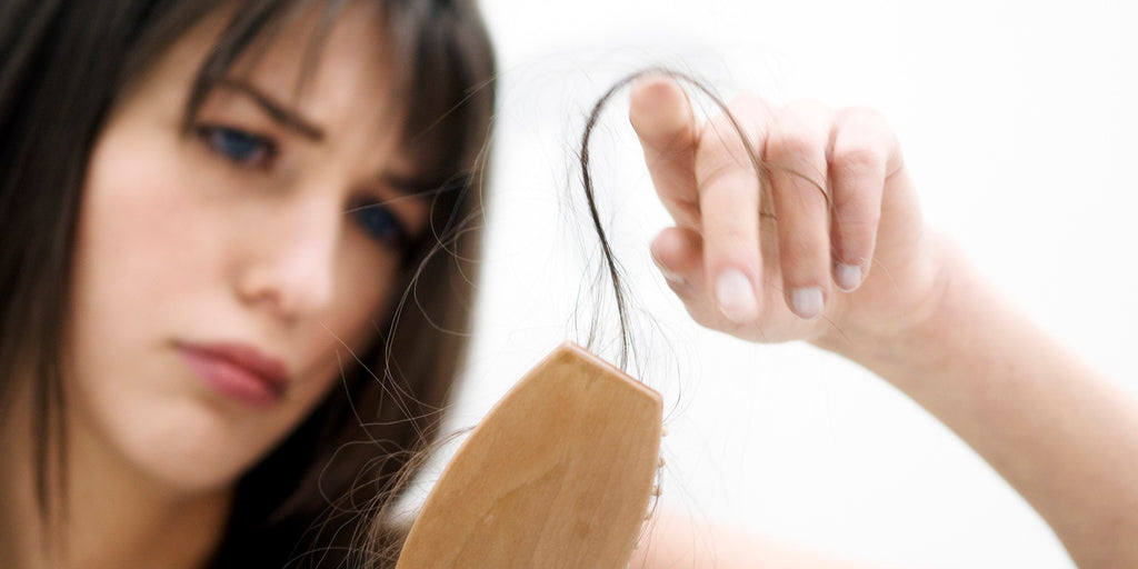 What are the main reasons behind women’s hair loss and how can one prevent it?